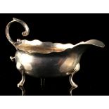 Property of a lady - a George II silver sauceboat, makers William Shaw II & William Preist, London