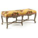 Property of a lady - a French Louis XV style grey painted & upholstered banquette or long stool,