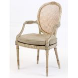 Property of a lady - an early 20th century George III style grey painted & cane panelled open