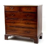 Property of a lady - a George III oak chest of two short & three long graduated drawers, with