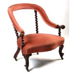 Property of a lady - a Victorian walnut & pink draylon upholstered armchair with barleytwist columns