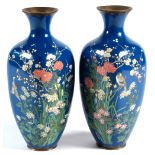 A pair of Japanese blue ground cloisonne rounded square section vases, Meiji period, early 20th