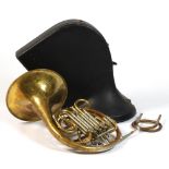 A brass French horn, inscribed 'Alliance / J.R. Lafleur & Son Ltd' and 'Boosey & Hawkes', cased (see