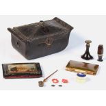 An 18th century leather casket with embossed chinaman & other figures, containing assorted items