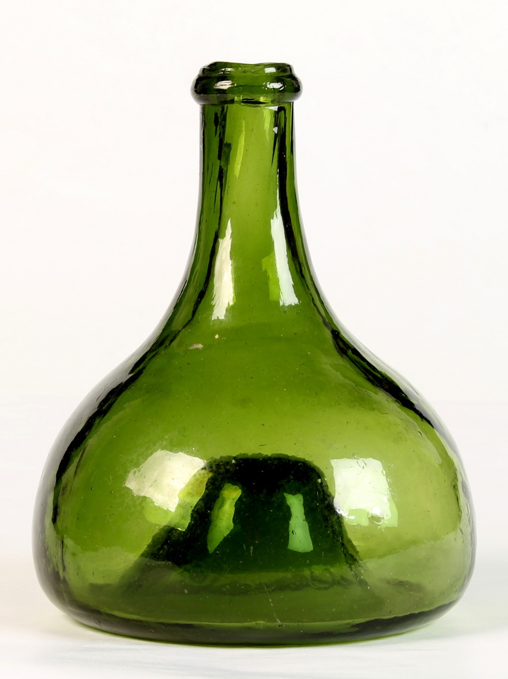 Property of a gentleman - a green glass 'onion' wine bottle, circa 1780, the high kick base