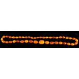 Property of a lady - a butterscotch amber graduated bead necklace, approximately 35 grams (see