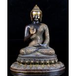 Property of a deceased estate - a bronze figure of a seated Buddha, on double lotus base, 11.