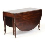 Property of a lady - an early 19th century mahogany later rounded rectangular topped double gate-leg