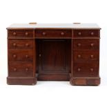 Property of a lady - a late Victorian mahogany kneehole dressing table base, the central drawer