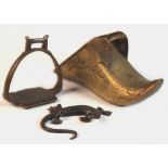 Property of a deceased estate - an ornate bronze stirrup, probably 19th century; together with