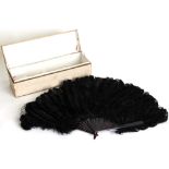 Property of a deceased estate - an early 20th century tortoiseshell & black ostrich feather fan,