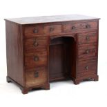 Property of a lady - an early 19th century George IV mahogany kneehole desk, 39ins. (99cms.) wide (