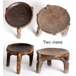 Ethnographia - two African tribal carved tripod stools, of good colour, each carved from a single