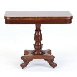 Property of a gentleman - a George IV goncalo alves swivel-top foldover tea table, circa 1825, the