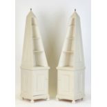 Property of a lady - a pair of modern cream painted obelisk shaped two-part cabinets, each with open