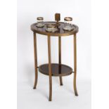 Property of a deceased estate - a French brass mounted mahogany oval two-tier smoker's table,