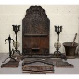 Property of a lady - a late 19th century North European cast iron fire-back; together with a