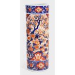 A late 19th century Japanese Imari stickstand, of cylindrical form, crack to base, 24.8ins. (63cms.)