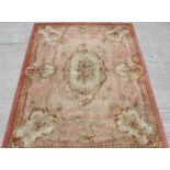 Property of a lady of title - a mid 19th century French Savonnerie carpet, circa 1860, with pink