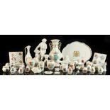 A collection of crested china, nearly all Goss, the tallest 10.5ins. (26.7cms.) high; together