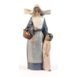 Property of a gentleman - a rare large Lladro figure - Charity - circa 1980, 16.25ins. (41.3cms.)