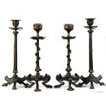 Property of a lady - two pairs of late 19th century French patinated bronze candlesticks, with