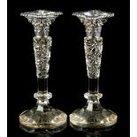 Property of a lady - a pair of Edwardian silver & cut glass Corinthian column candlesticks, makers