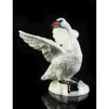 Property of a lady - a late 19th / early 20th century Meissen model of a Swan, blue crossed swords