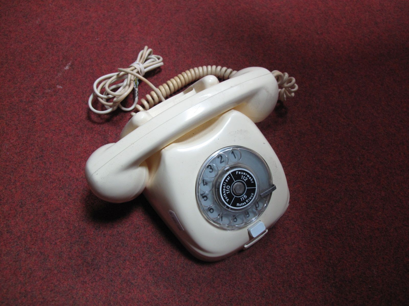 A Cream Bakelite German Telephone, with "Tesla" label 1971, purple stamped "TA 32".