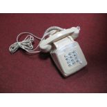 A Cream Coloured Late XX Century French Push Button Telephone, with separate speaker in cradle,