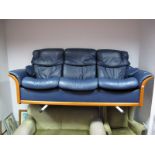 A Stressless Three Seater Home Theatre Settee, in blue leather.