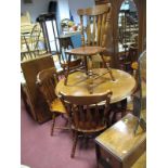 Extending Kitchen Table, together with six kitchen chairs, with shaped top rails, solid seats,