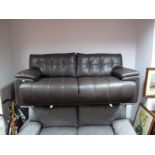 An Infinity Endurance Three Seater Sofa, in dark brown leather, with white stitching, on chrome