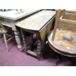 Late XVII Century and Later Oak Gate Leg Table, with an oval top, o bobbin and block supports,