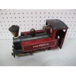 A Mamod 0-4-0 Live Steam Locomotive "Victoria", finished in black and maroon, been steamed with