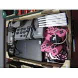 A Sony Playstation 2 #SCPH- 30003 Pal Black, with a Sony Playstation 2 #SCPH-77003 Slim Pink, with