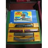 A Hornby Dublo Three Rail Set. Comprising 4-6-2 Duchess of Montrose and two coaches and track. All