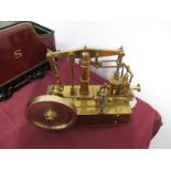 A Scale Engineered Model of a Beam Engine. Made of brass and positioned on a wooden plinth. 12.