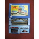 A Hornby Dublo Three Rail Set No. EDG18. Comprising a 2-6-4 Standard Tank and three wagons. All