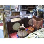 A Circa 1950's Bush Mottled Brown Bakelite Valve Radio, twin dial, gilt grille, and a similar Bush