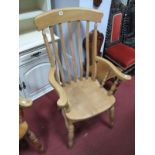 A Farmhouse Kitchen Armchair, with slatted back.