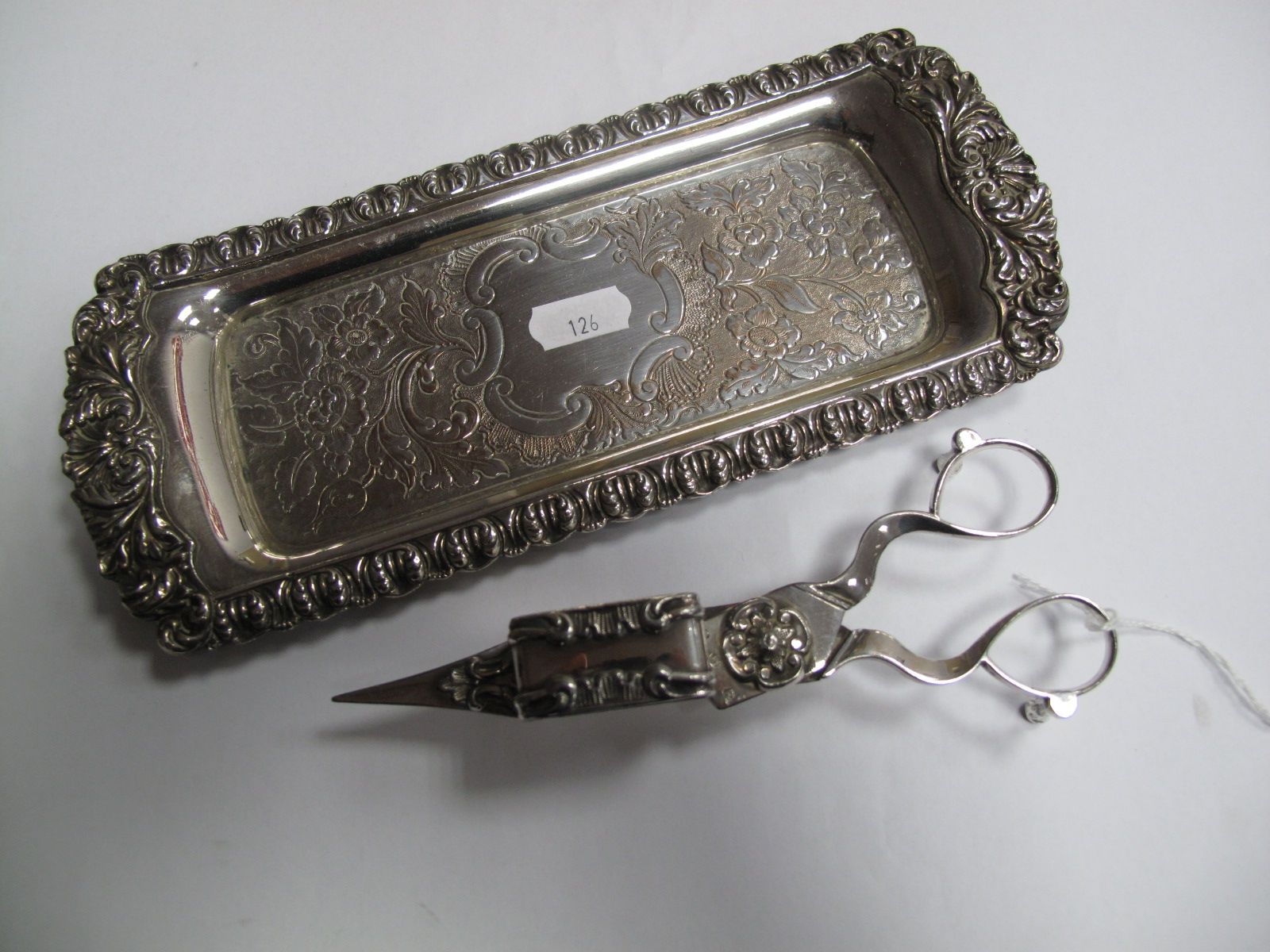 A Pair of XIX Century Plated Candle Snuffers, stamped; together with a plated tray/stand, with