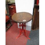 A Victorian Bar/Conservatory Table, with cast iron triform base, in the manner of Coalbrookdale.