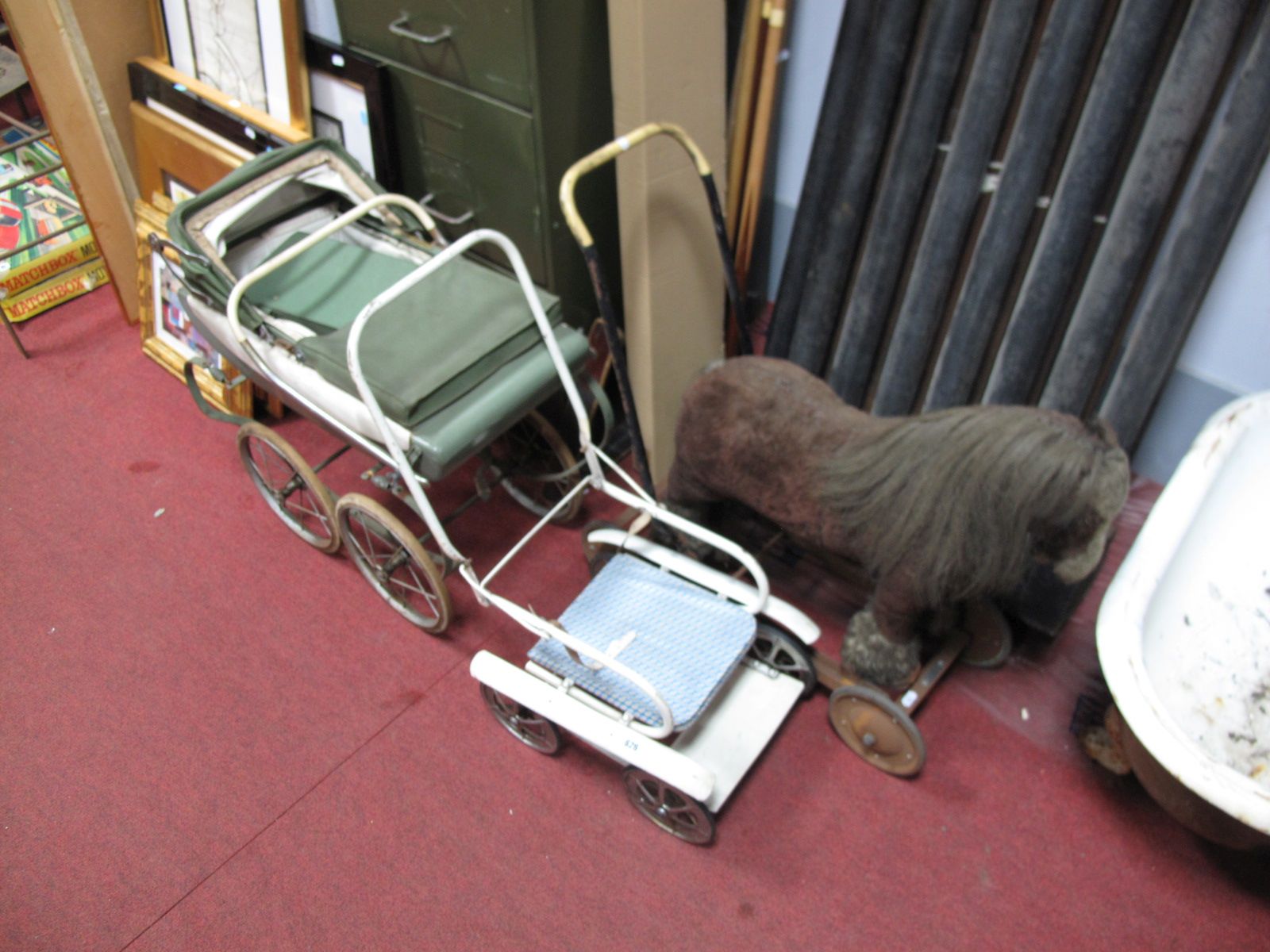 An Early XX Century Strawfilled Push-a-Long Rocking Shire Horse, a circa 1960's Tri-ang "Silvercross