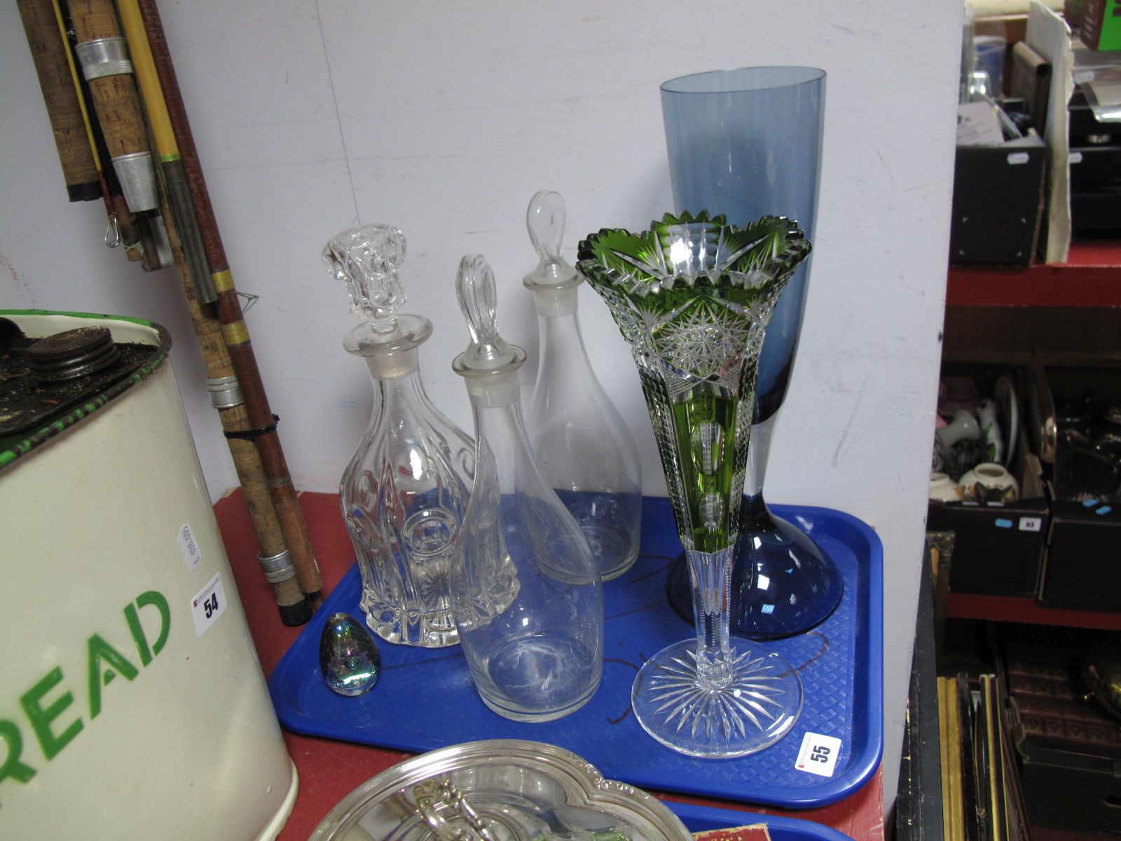 A Victorian Clear Glass Mallet Shaped Decanter, two Georgian style decanters with bullseye stoppers,