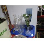 A Victorian Clear Glass Mallet Shaped Decanter, two Georgian style decanters with bullseye stoppers,