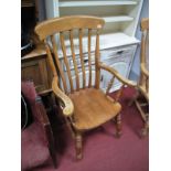 A Country Farmhouse Slat Back Armchair, with spindle supports. Stamped "Pine Gallery, High Peak