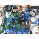 A Collection of Over Twenty-Five Victorian and Later Coloured and Clear Glass Bottles, including