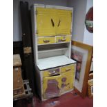 A Mid XX Century Painted Aluminium Kitchen Cabinet, having twin cupboard doors over two short