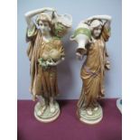 A Pair of Early XX Century Royal Dux China Figures, modelled as a Roman couple, he with a basket